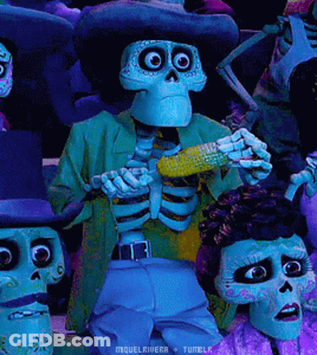 A Skeleton Is Holding A Corn On The Cob In A Crowd GIF