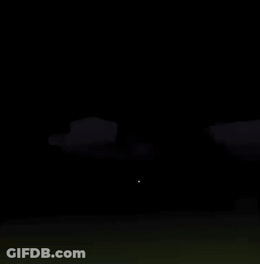 A Skeleton Is Standing On A Grassy Hill In A Dark Video Game . GIF