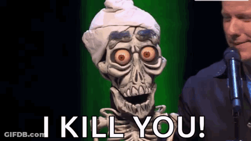 A Skeleton Puppet Is Standing In Front Of A Man Holding A Microphone And Saying I Kill You . GIF