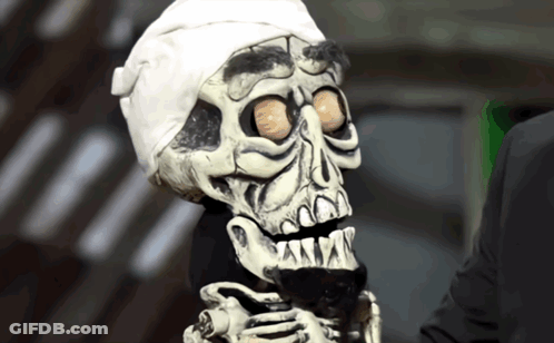 A Skeleton With A Bandaged Head And A White Headband GIF