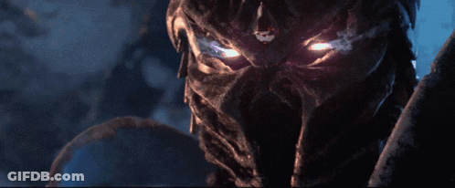 A Skeleton With Blue Eyes Is Holding A Large Hammer GIF