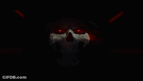 A Skull With Red Eyes Is Wearing A Blue Hoodie GIF