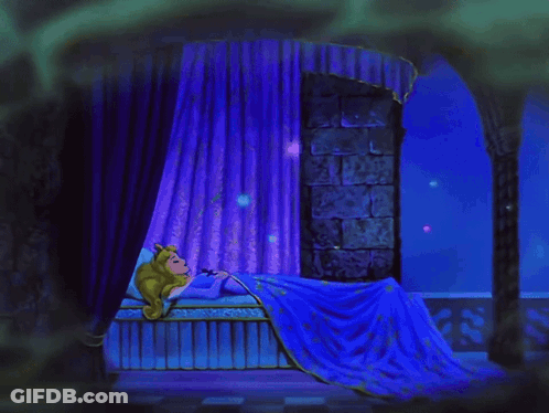 A Sleeping Princess Is Holding A Rose In Her Hand GIF