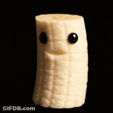 A Slice Of Banana With A Face On It And Black Eyes GIF