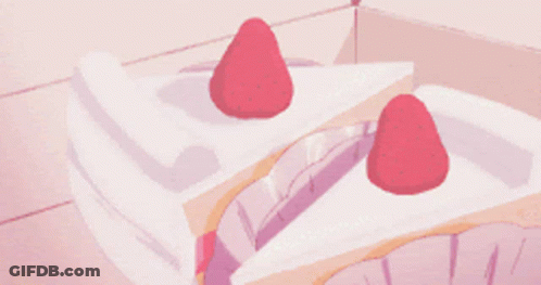 A Slice Of Cake With Strawberries On Top Of It GIF