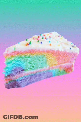 A Slice Of Rainbow Cake With Sprinkles On Top GIF