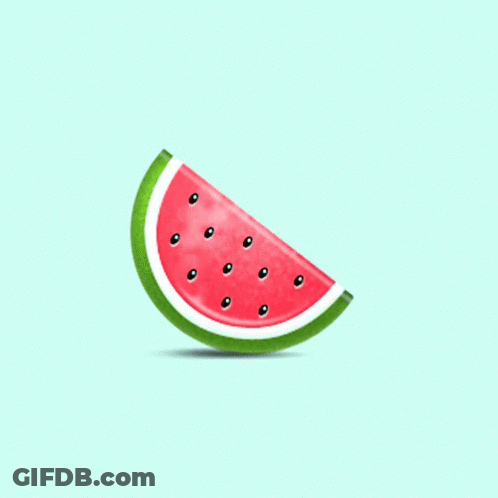 A Slice Of Watermelon With Black Seeds On It GIF