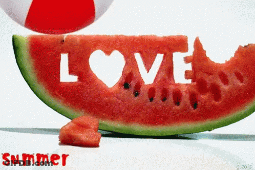A Slice Of Watermelon With The Word Love Carved Out Of It GIF