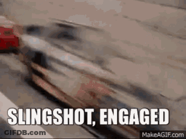 A Slingshot Engaged GIF With A Car Driving Down A Highway . GIF