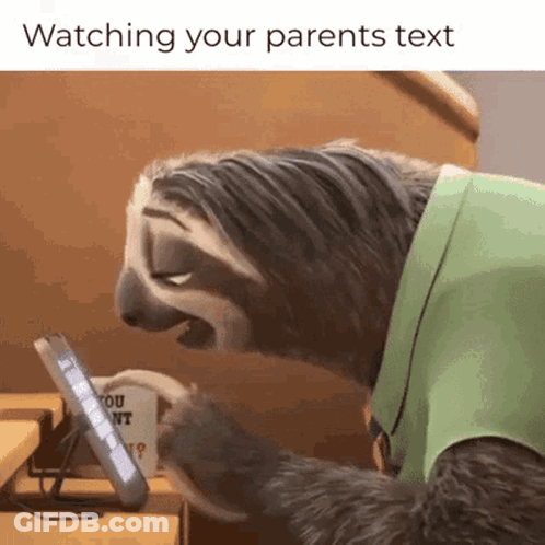 A Sloth Wearing A Green Shirt Is Looking At A Tablet With The Caption " Watching Your Parents Text " GIF