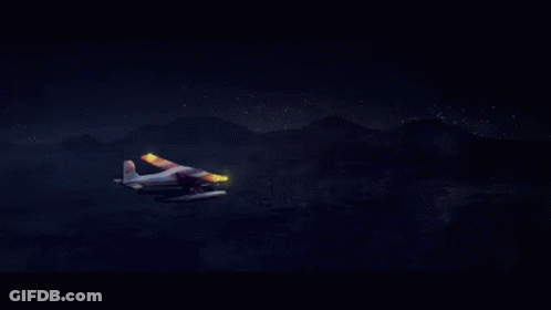 A Small Plane With A Red Bull Logo On The Side Is Flying In The Night Sky GIF