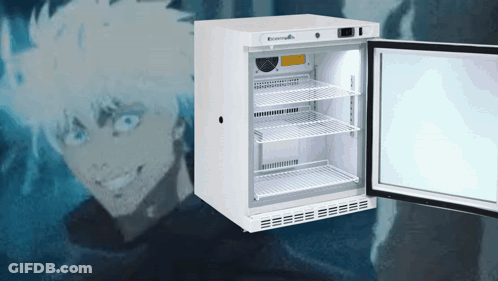 A Small White Fridge With The Door Open And A Man Behind It GIF