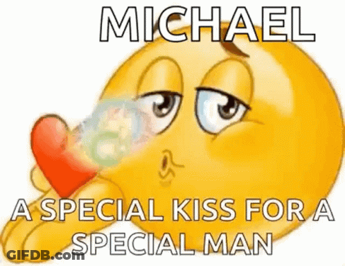 A Smiley Face Is Holding A Heart In Its Hand And Saying `` Michael , A Special Kiss For A Special Man '' . GIF