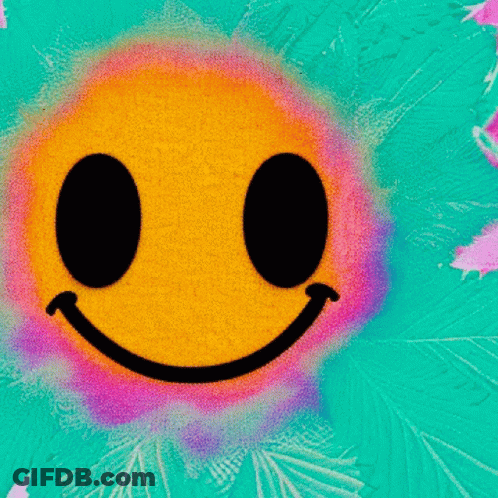 A Smiley Face With Black Eyes And A White Smile GIF