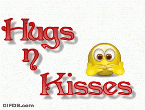 A Smiley Face With Hearts And The Words Hugs N Kisses Above It GIF