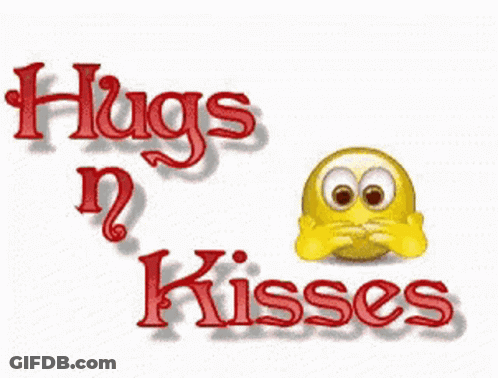 A Smiley Face With Hearts And The Words Hugs N Kisses Behind It GIF