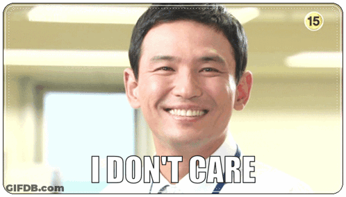 A Smiling Man With The Words " I Don T Care " On The Bottom GIF