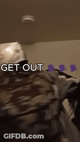 A Smoke Detector Is Above A Person With The Words Get Out Below Them GIF