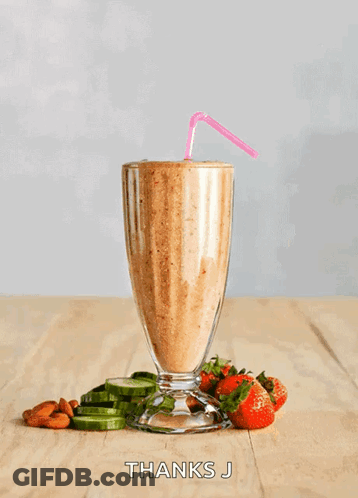 A Smoothie In A Tall Glass With Straws Next To Strawberries And Cucumbers And The Words Thanks J Below It GIF