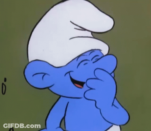 A Smurf Covering His Face With His Hand While Smiling GIF