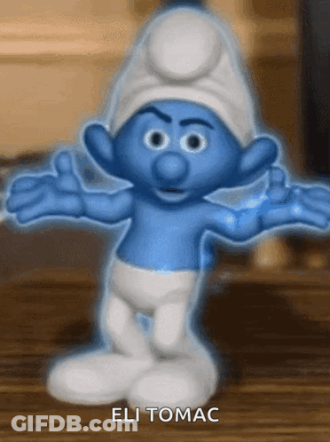 A Smurf Giving A Thumbs Up With The Name Eli Tomac Below Him GIF