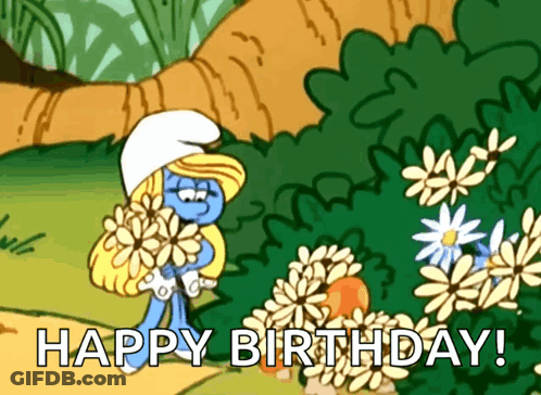A Smurf Holding A Bunch Of Flowers With The Words Happy Birthday GIF