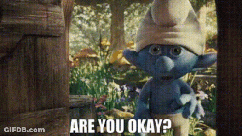 A Smurf Is Standing In A Garden And Asking Are You Okay ? GIF