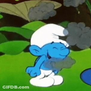 A Smurf Is Standing In The Grass With His Eyes Closed And Smiling GIF