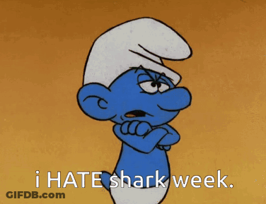 A Smurf With His Arms Crossed And The Words I Hate Shark Week GIF