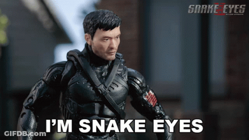A Snake Eyes Action Figure With The Words I 'M Snake Eyes On The Bottom GIF