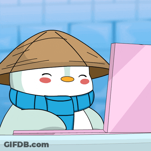 A Snowman Wearing A Hat And Scarf Is Sitting In Front Of A Laptop GIF