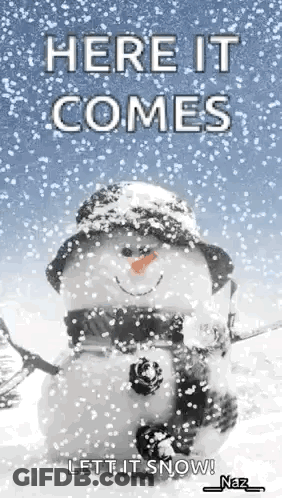 A Snowman Wearing A Hat And Scarf Is Standing In The Snow With The Words Here It Comes Let It Snow . GIF