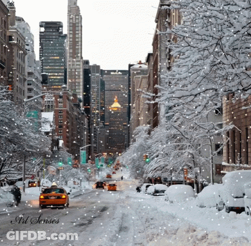 A Snowy City Street With The Words Art Senses On The Bottom Left GIF
