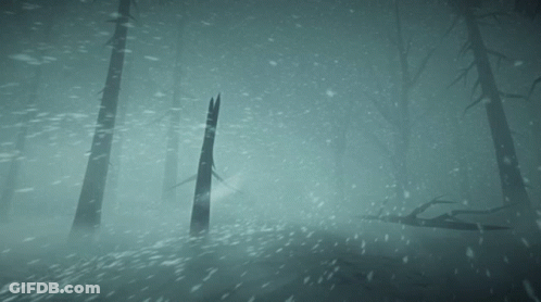 A Snowy Forest With Trees In The Foreground And A Fallen Tree In The Background GIF