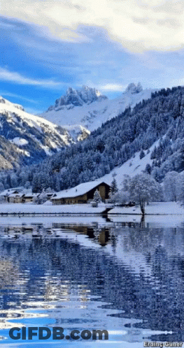 A Snowy Landscape With A Lake In The Foreground And The Words Erding Gunner At The Bottom GIF