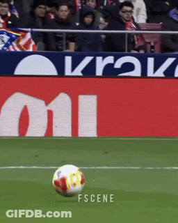 A Soccer Ball Is Being Kicked In Front Of A Sign That Says Krak On It GIF
