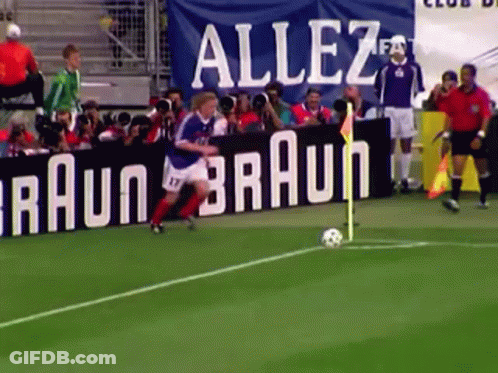 A Soccer Field With A Banner That Says Allez Braun GIF