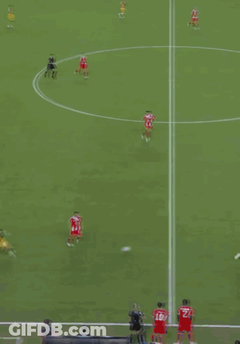A Soccer Field With A Banner That Says " Futbol Unites " On It GIF