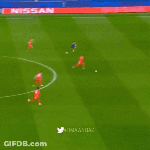 A Soccer Field With A Nissan Sign On The Side GIF