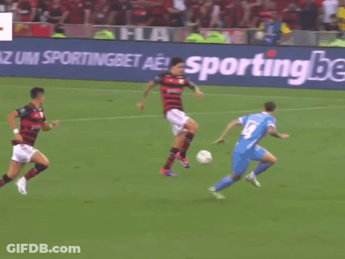A Soccer Field With A Yellow Sign That Says Livre On It GIF