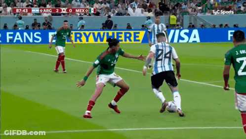 A Soccer Game Between Argentina And Mexico Is Being Played GIF