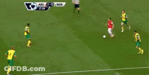 A Soccer Game Between Arsenal And Norwich Is Being Shown On Tv GIF