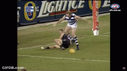 A Soccer Game Between Geel And Ess Is Being Shown On A Television Screen GIF