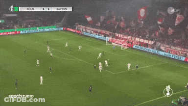 A Soccer Game Between Koln And Bayern Is Being Shown On The Screen GIF