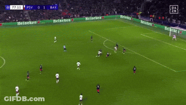 A Soccer Game Is Being Played Between Psv And Bay With Heineken Ads On The Sidelines GIF