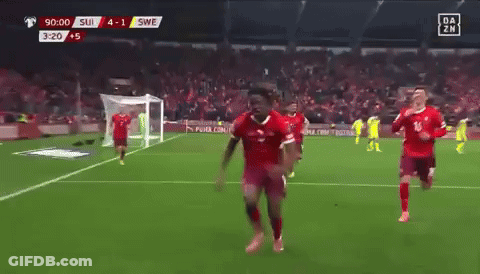 A Soccer Game Is Being Played Between Suisse And Swea GIF