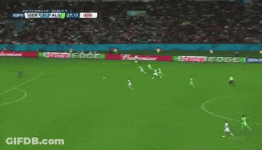 A Soccer Game Is Being Played Between The Germans And The Algerians GIF