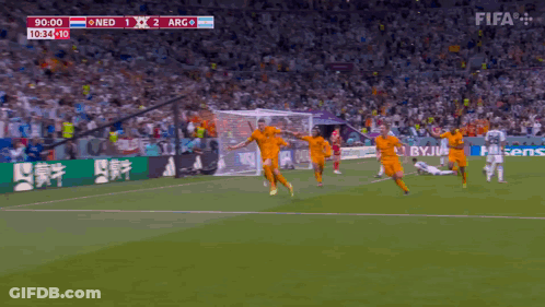 A Soccer Game Is Being Played Between The Netherlands And Arg GIF