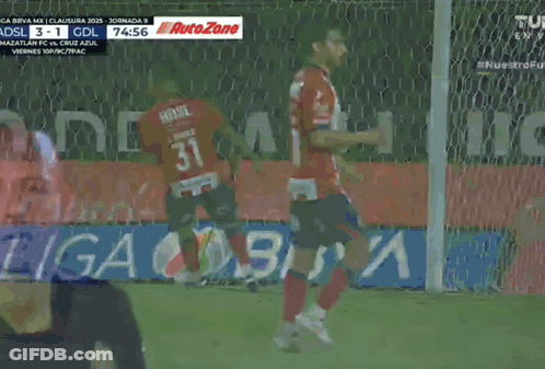 A Soccer Game Is Being Played In A Stadium And The Score Is 3 To 1 GIF
