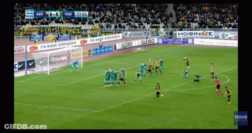 A Soccer Game Is Being Played In A Stadium Sponsored By Globo And Nova GIF